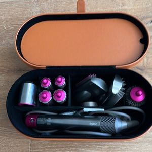 Dyson air wrap system with pink accent